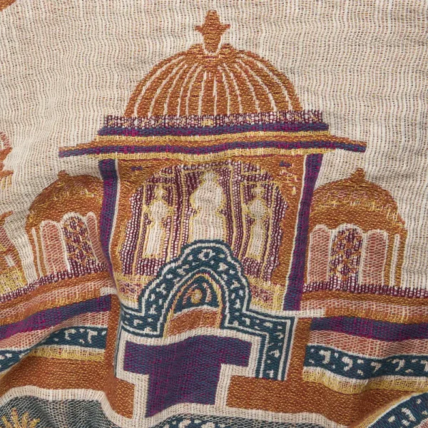 ETRO HOME Shanti throw in teal blue with a red and gold Italian pattern and fringed edge