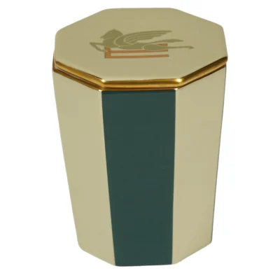 Green and ivory scented candle in an octagonal case